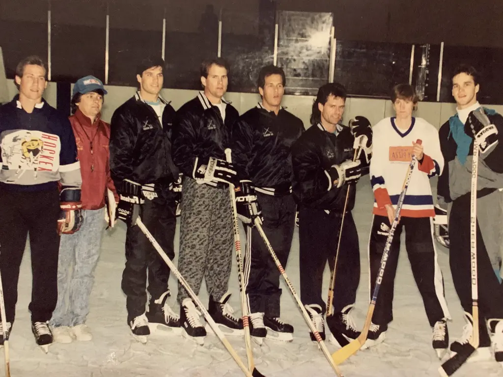 Brad Article Hockey team posing on ice rink.