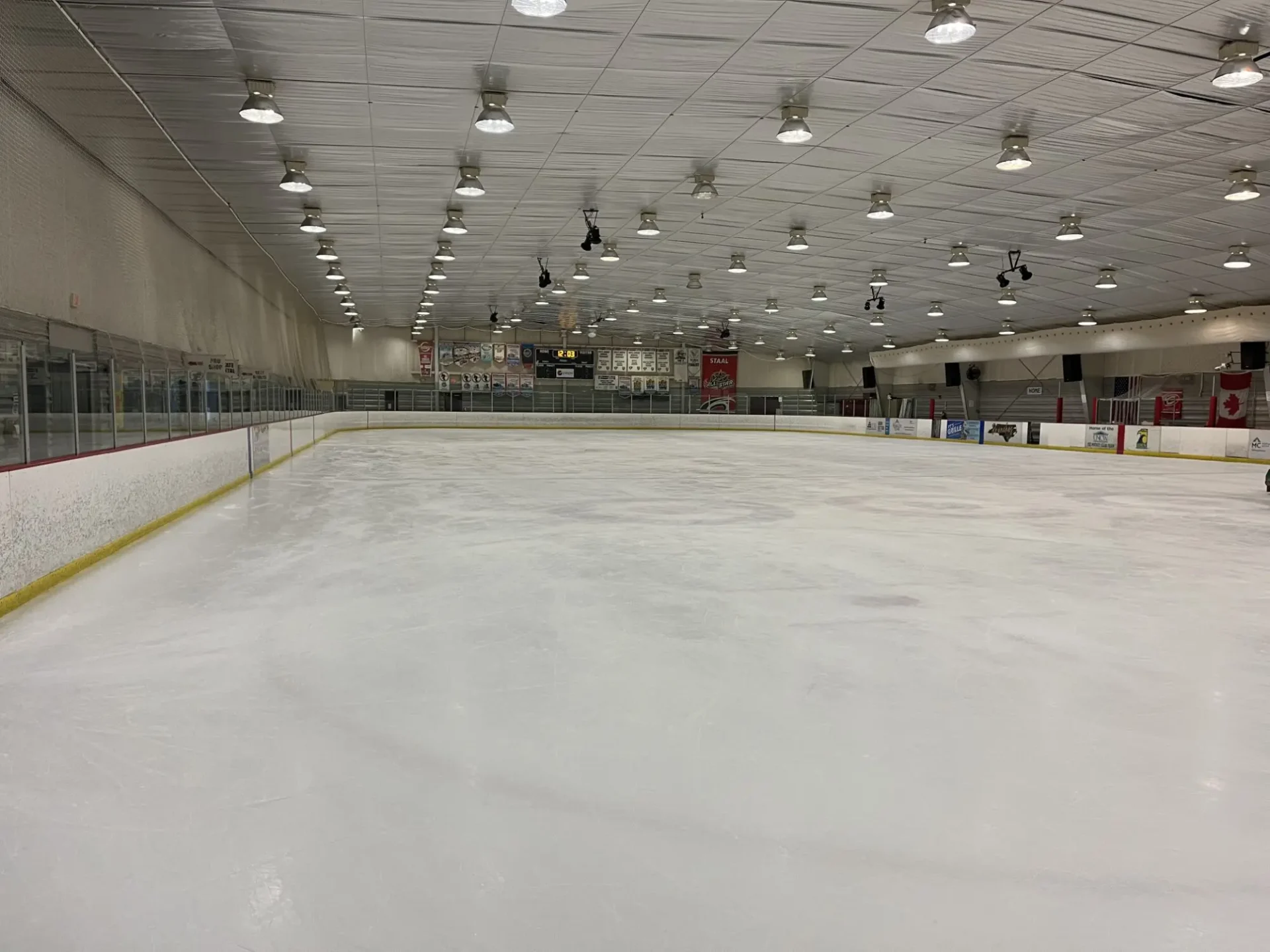 Empty indoor ice hockey rink.